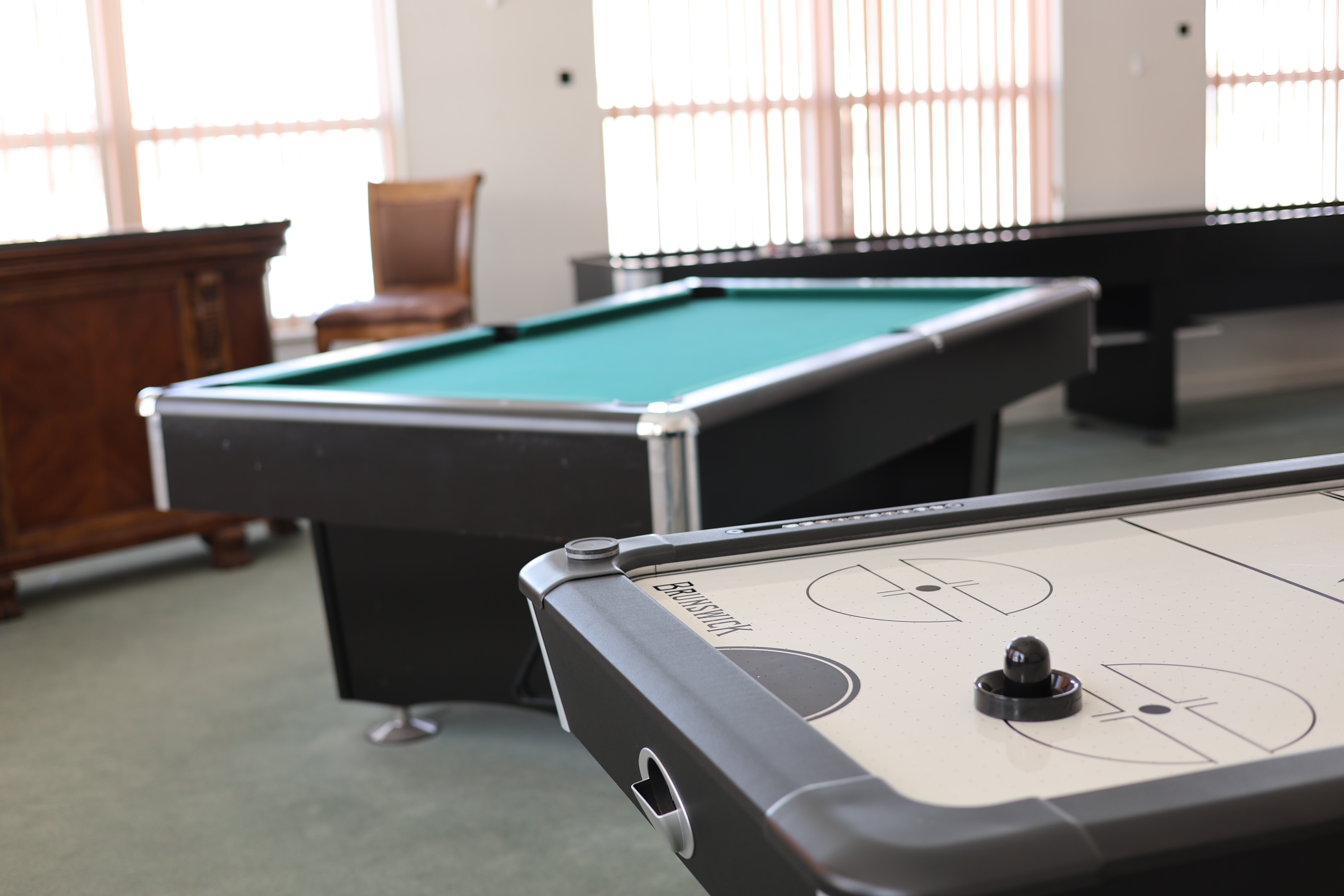 Toledo recreation room with pool and air hockey tables